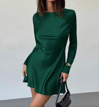 Green Open-Back Mini Dress.