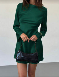 Green Open-Back Mini Dress.