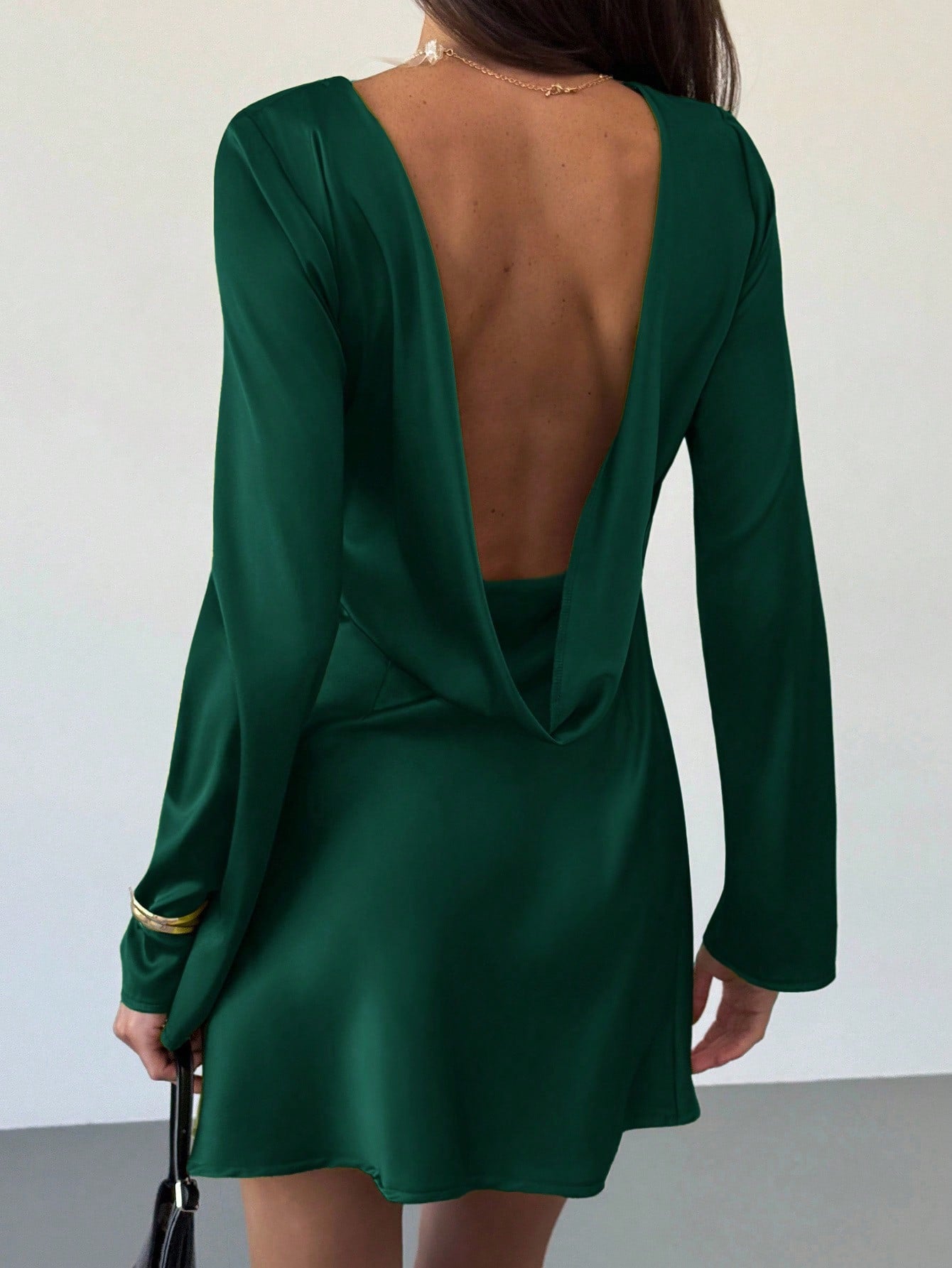 Green Open-Back Mini Dress.