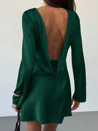 Green Open-Back Mini Dress.