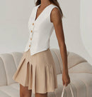 White Buttoned Vest & Pleated Skirt Set.