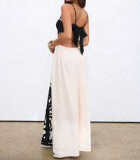 Palm Print Cut-Out Maxi Dress.